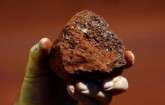 Top iron ore firms unlikely to form cartel and cut output: Goldman